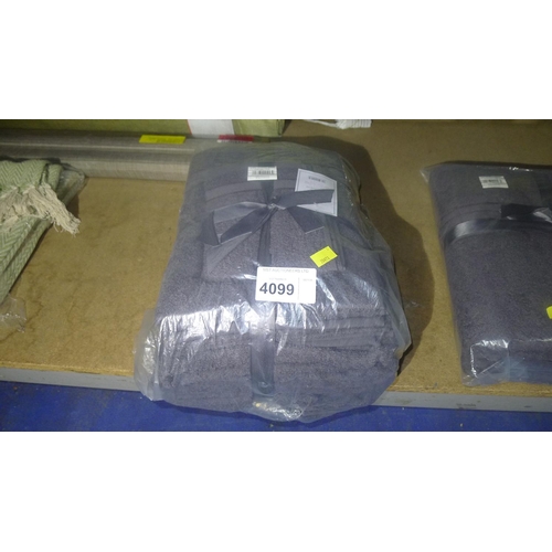 4099 - A 12 piece charcoal towel bail