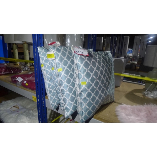 4109 - 4 x teal patterned scatter cushions