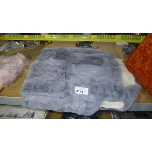 4111 - A Cooke shaggy faux fur rug