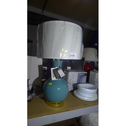 4196 - 1 Safavieh bluey / green ceramic table lamp with a white shade, approx 65cm high