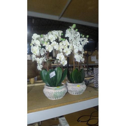 4217 - 2 artificial orchid plants each in a ceramic planter