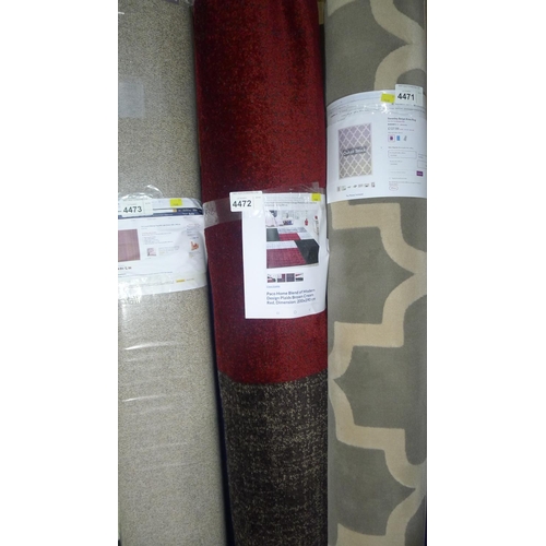 4472 - A brown, cream & red patterned rug by Paco home approx 200x290cm