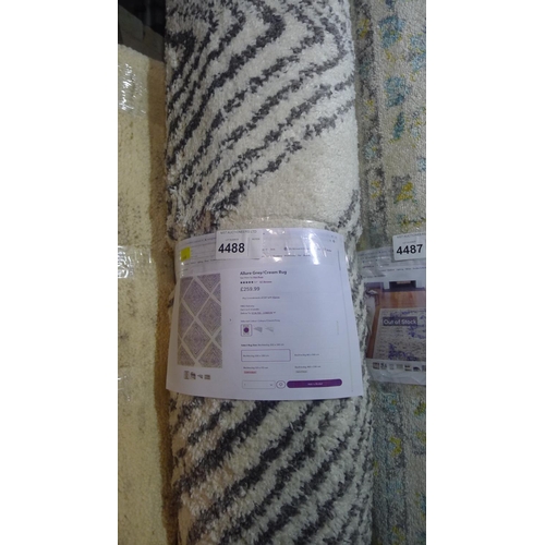 4488 - A grey and cream patterned rug approx 200x290cm RRP £259