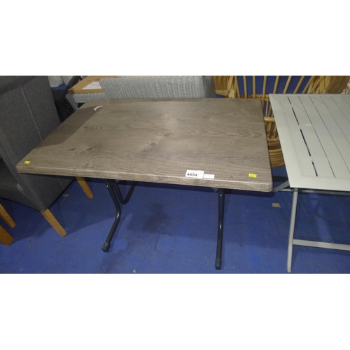 4654 - A wood effect metal framed dining table approx 110x69cm