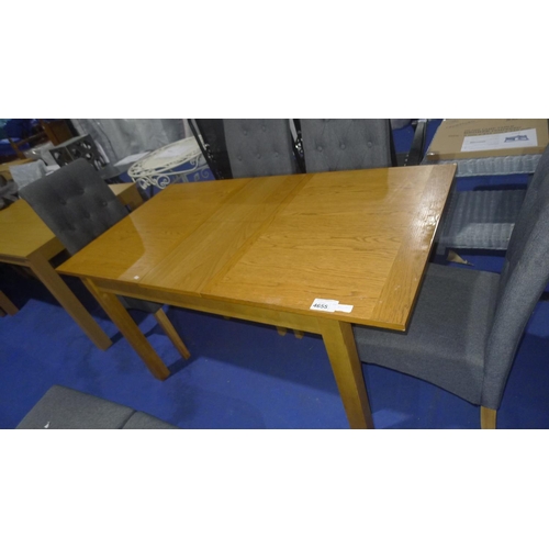 4655 - A wooden extendable dining table approx 120cm or 150x80 extended