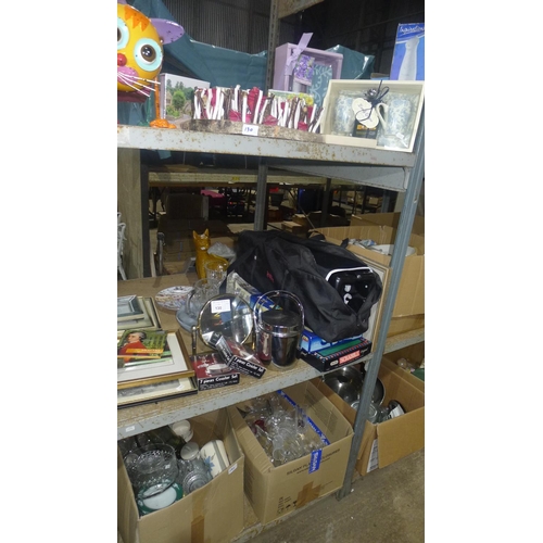 130 - A quantity of various items including glassware, crockery, travel cot, gift sets etc. Contents of on... 