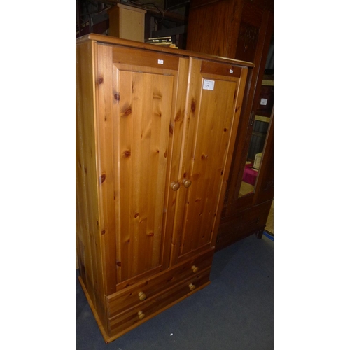 171 - A pine 3/4 height 2 door, 2 drawer wardrobe