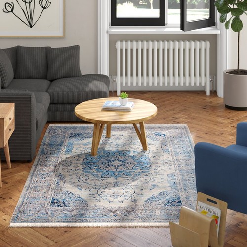 4478 - A blue patterned rug by Fleur-De-Lis approx 160x230cm