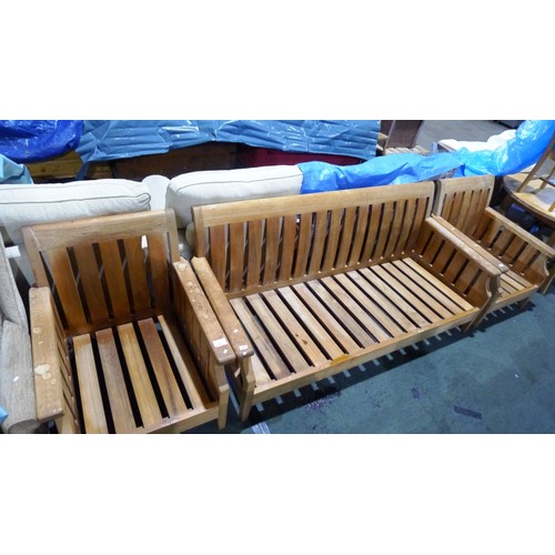 182 - A large solid wood (teak ?)sofa/conservatory set consists of 4 seater seat and 2 arm chairs please n... 