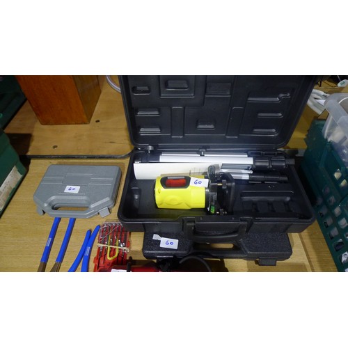 60 - A quantity of various tools including a laser level, hot air gun, glue gun etc