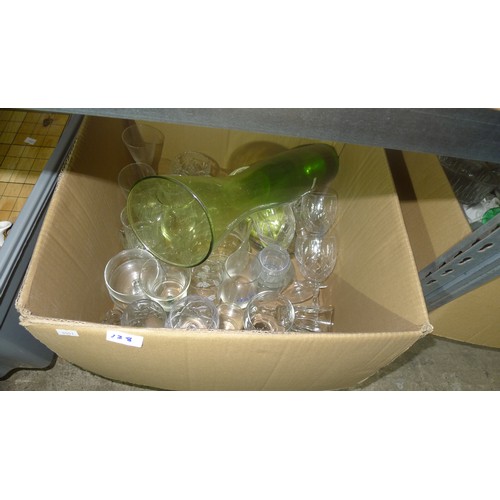 128 - A quantity of various items including glasses, crockery etc. Contents of one shelf