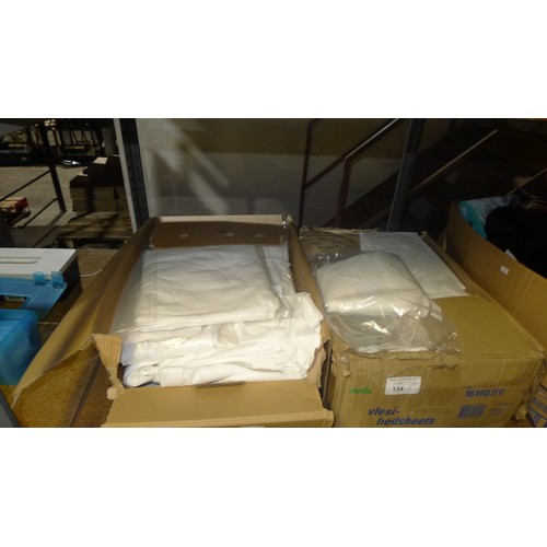 134 - A quantity of various items including bed pads, xxxl disposable gloves, nappy bin etc. Contents of o... 