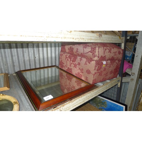 174 - A quantity of various cushions, mirrors and an upholstered pouffe, contents of one shelf