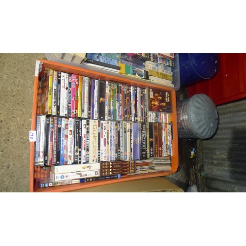 175 - A quantity of various items including a fondue le creuset set, many DVDs, books, bins, wicker basket... 