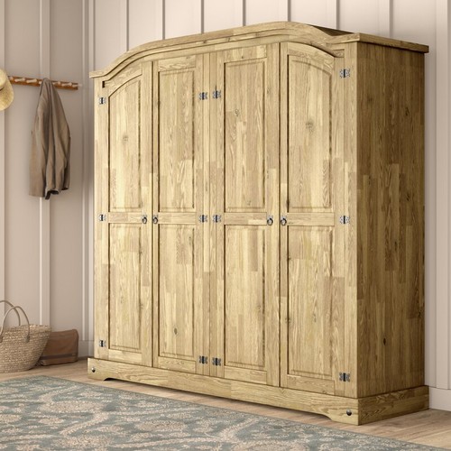 4543 - A 4 door distressed waxed pine effect wardrobe RRP £359