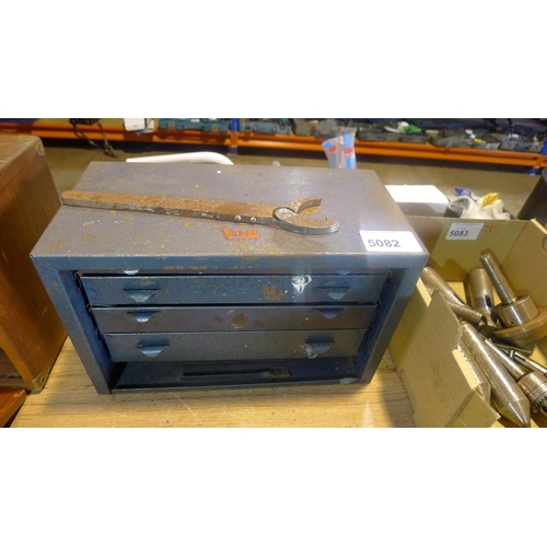 5082 - A blue metal 4 drawer engineers cabinet containing various drill bits, spanners etc (see photographs... 