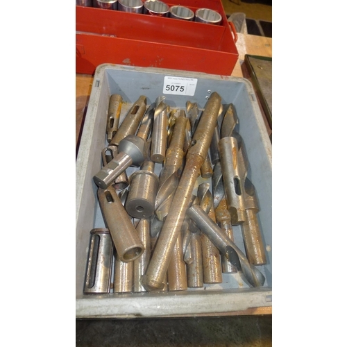 5075 - 1 box containing a quantity of various drill sleeves and drill bits