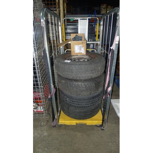 5368 - 4 steel wheels with 195/65 R15 tyres fitted - removed from a VW Caddy. The wheeled cage is not inclu... 