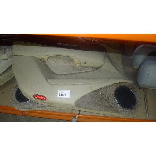 5264 - A quantity of various vehicle parts including a vintage grille, Jaguar door cards, 2 lights etc. Con... 