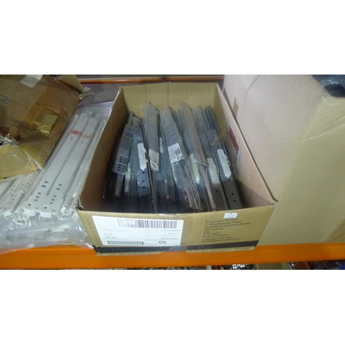 5283 - A quantity of various items including drawer runners, screw caps, kitchen cabinet legs etc. Contents... 