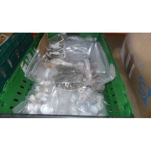 5288 - A quantity of various drawer handles and knobs. Contents of 1 green plastic crate which is not inclu... 