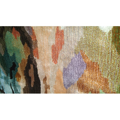 4541 - A New Zealand woolen multi-coloured abstract area rug approx 7'9