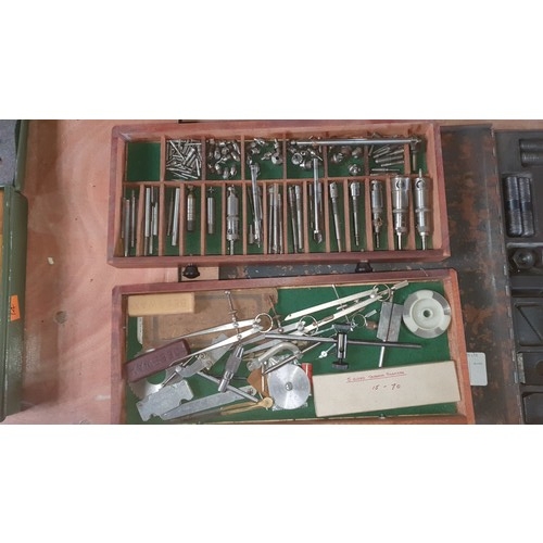 5081 - A wooden 7 drawer tool makers cabinet with removable front panel  containing various precision tools... 