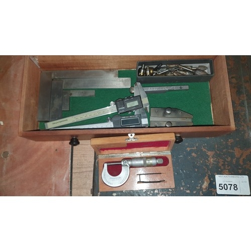 5081 - A wooden 7 drawer tool makers cabinet with removable front panel  containing various precision tools... 