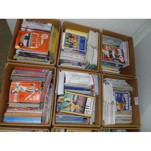 8121 - 1 pallet containing a large quantity of various football programmes and 1 black lever arch file cont... 