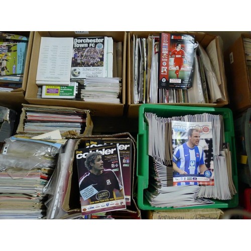 8125 - 1 pallet containing a large quantity of various football programmes and 1 black lever arch file cont... 