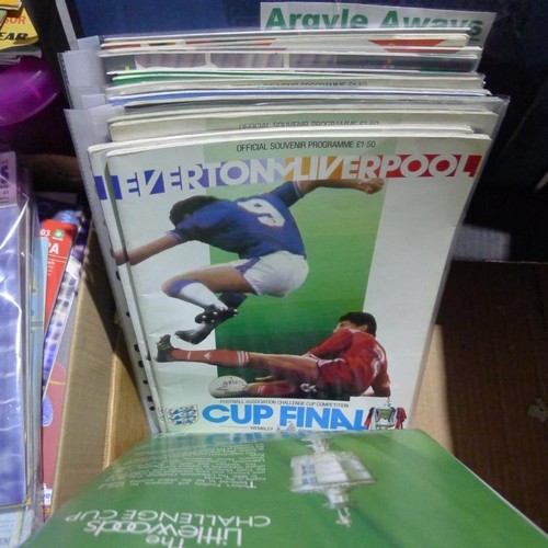 8128 - 1 pallet containing a large quantity of various football programmes including finals and ties for FA... 