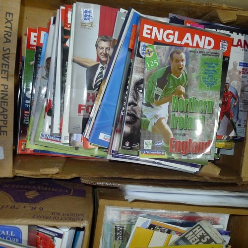 8129 - 1 pallet containing a large quantity of various football programmes including England Internationals... 