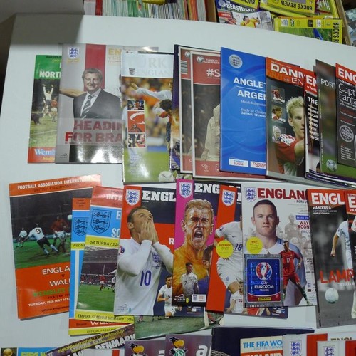 8129 - 1 pallet containing a large quantity of various football programmes including England Internationals... 