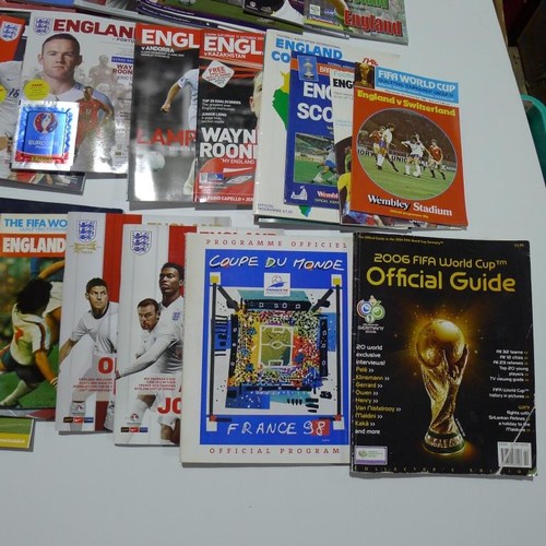 8129 - 1 pallet containing a large quantity of various football programmes including England Internationals... 