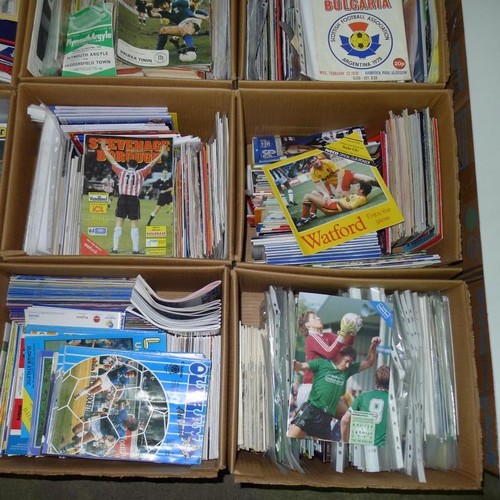 8182 - 1 pallet containing a large quantity of various football programmes and 2 black lever arch files con... 