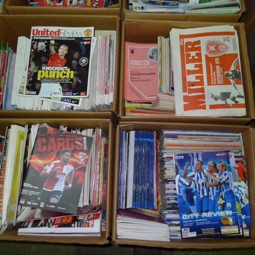 8183 - 1 pallet containing a large quantity of various football programmes and 2 black lever arch files con... 