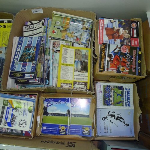 8185 - 1 pallet containing a large quantity of various football programmes and 2 black lever arch files con... 