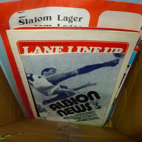 8197 - 1 box marked 'Currently on Ebay' containing a quantity of various football programmes, team sheets e... 