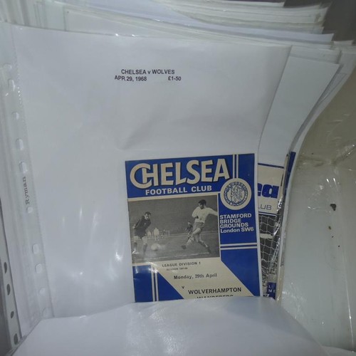 8203 - 1 box containing a quantity of Chelsea football programmes mainly from the 1950s and 1960s. There ar... 