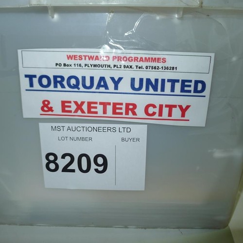 8209 - 1 box containing a quantity of Torquay United and Exeter City football programmes mainly from the 19... 