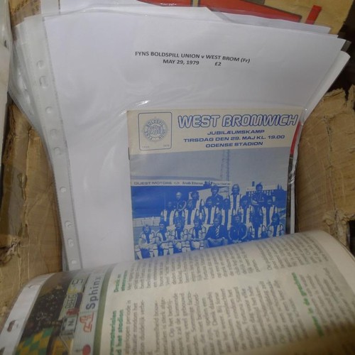 8210 - 2 boxes containing various Irish home and away football programmes and various other foreign footbal... 