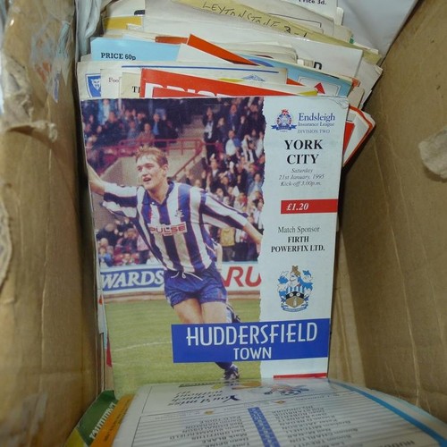 8217 - 5 boxes containing a quantity of various football programmes mainly from the 1960s onwards. Clubs in... 