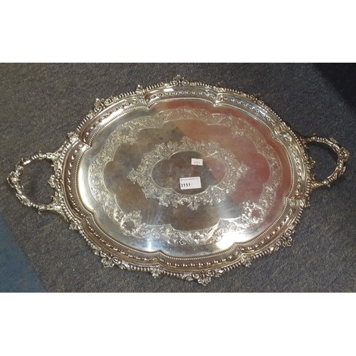 3151 - (H1) a large oval engraved silver tea tray with two handles approximately 59 cm long weighing approx...