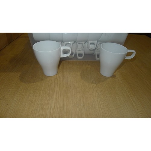 1069 - A box containing a quantity of (approx 50) white matching coffee mugs