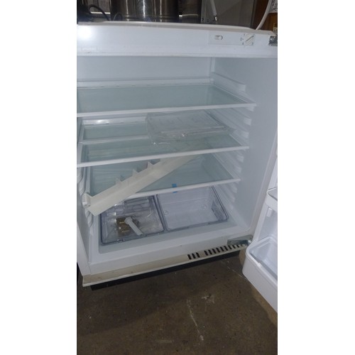 1105 - An integrated fridge by Whirlpool type uc-148a/z, signs of long storage but appears unused, worked w... 