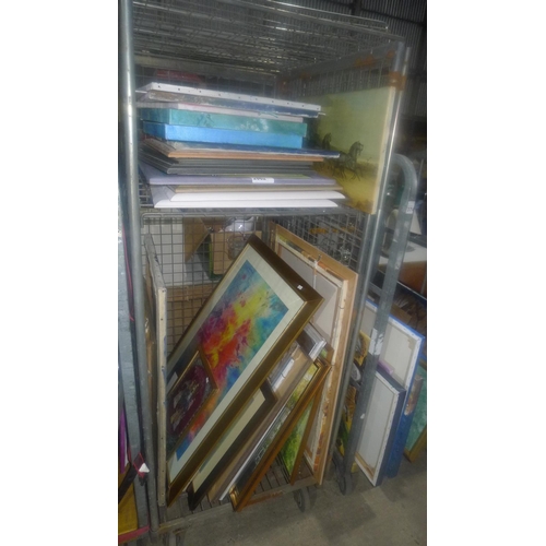 2062 - A quantity of various pictures and prints. Contents of 1 wheeled cage which is not included