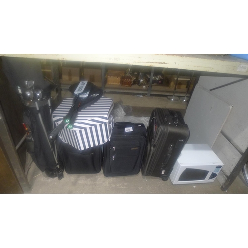 2079 - 3 various travel cases, 1 Panasonic microwave oven 240v, 1 golf caddy bag containing various  golf c... 