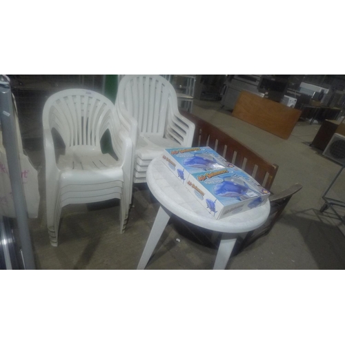 2086 - 1 white plastic circular garden table diameter approx 79cm and 9 stacking white plastic chairs