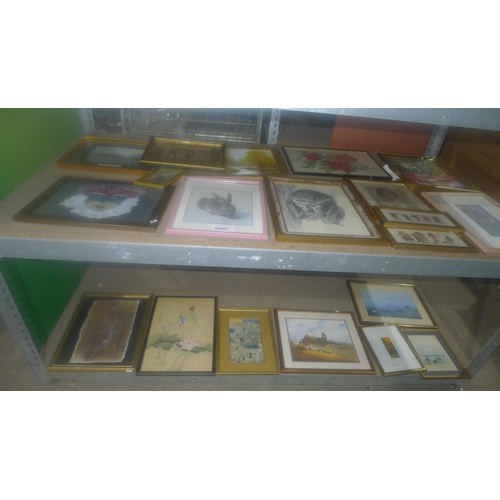 2092 - A quantity of various pictures and prints. Contents of 2 shelves