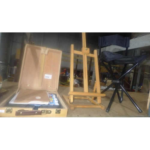 2098 - 1 artists wooden paint / easel box containing tubes of oil / water colour paint and 1 folding chair.... 